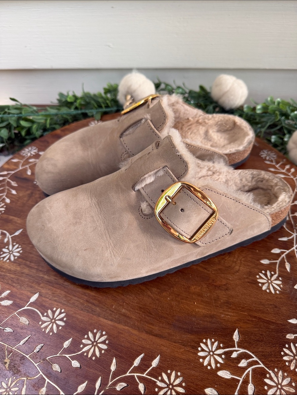 Birkenstock Faux Fur-Lined Suede Clog Mule in Taupe with Gold Buckle.